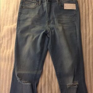 Brand new skinny jeans with holes in knee